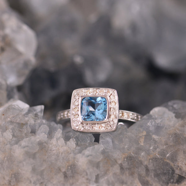 9ct White Gold Blue Topaz and Diamond Halo Ring