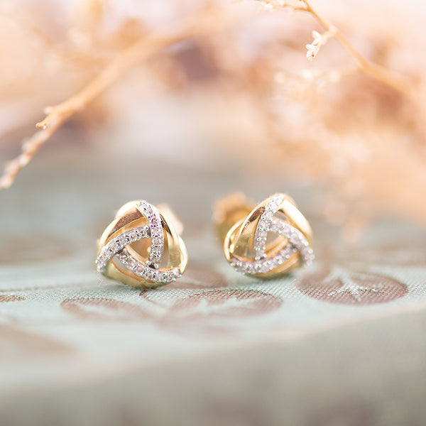 Diamond Trilliant Twist stud earrings.