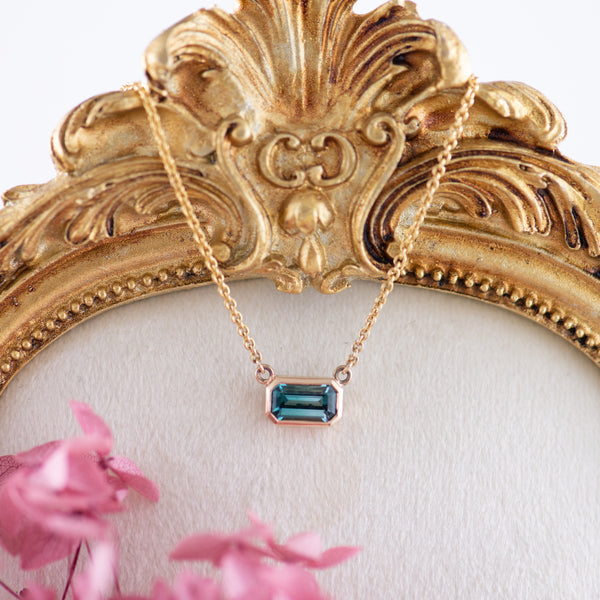 9K Yellow Gold Emerald cut Lagoon blue Tourmaline bezel