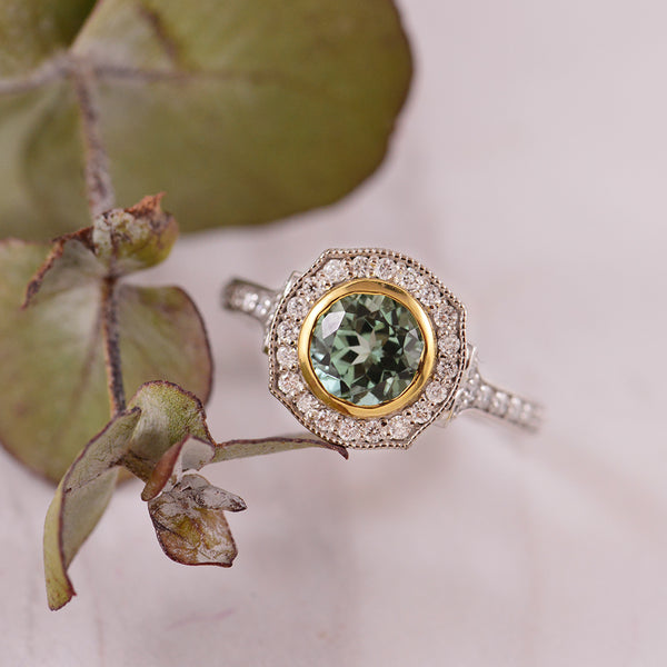 Seafoam Tourmaline 18K White & Yellow Gold ring with a diamond Halo.