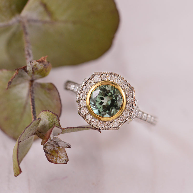 Seafoam Tourmaline 18K White & Yellow Gold ring with a diamond Halo.