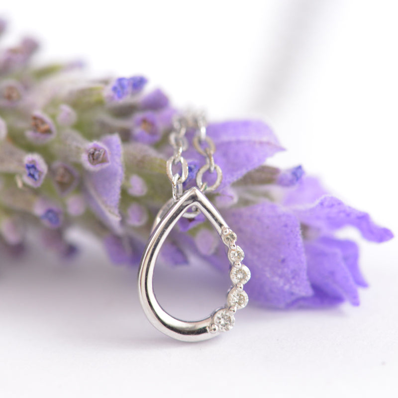 Diamond Pendant. Pear shape and made in white gold.