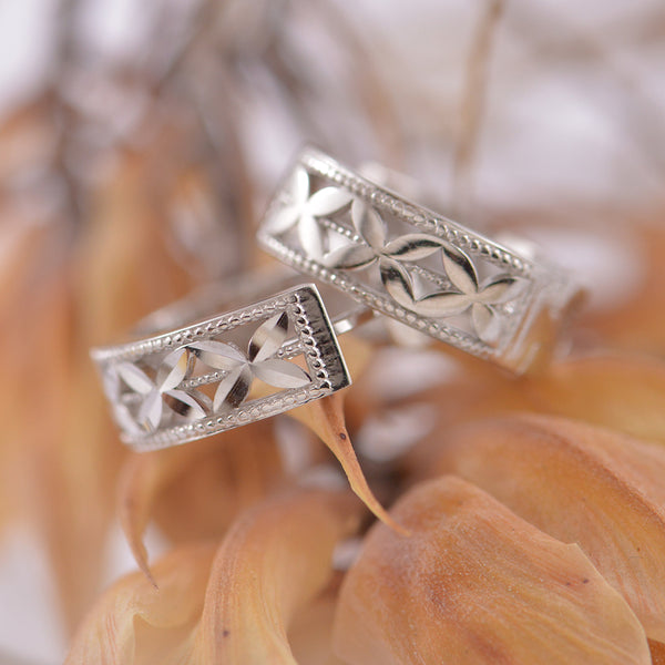 Pierced Motif White Gold Huggy earrings.