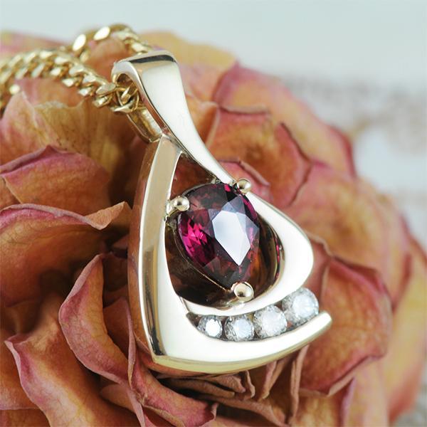 Garnet and Diamond Pendant in Yellow Gold