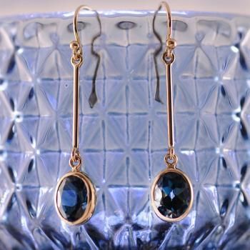 London Blue Topaz Oval Bezel Long Dangle Earrings in 9k Yellow Gold