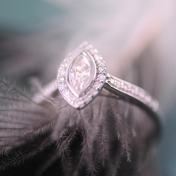 Elegant 18k White Gold Marquise Diamond Ring