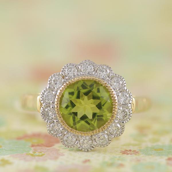 Peridot & Diamond Halo Ring set in 9k Yellow Gold