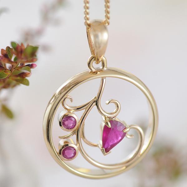 Ruby Pendant featuring Recycled Wedding Band as the frame and floral theme.