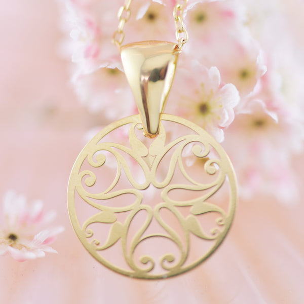 Scroll Pendant made in 9k Yellow Gold.