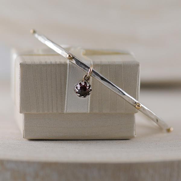 Sterling Silver Hammered Bangle with 9ct Yellow Gold balls & Garnet Charm