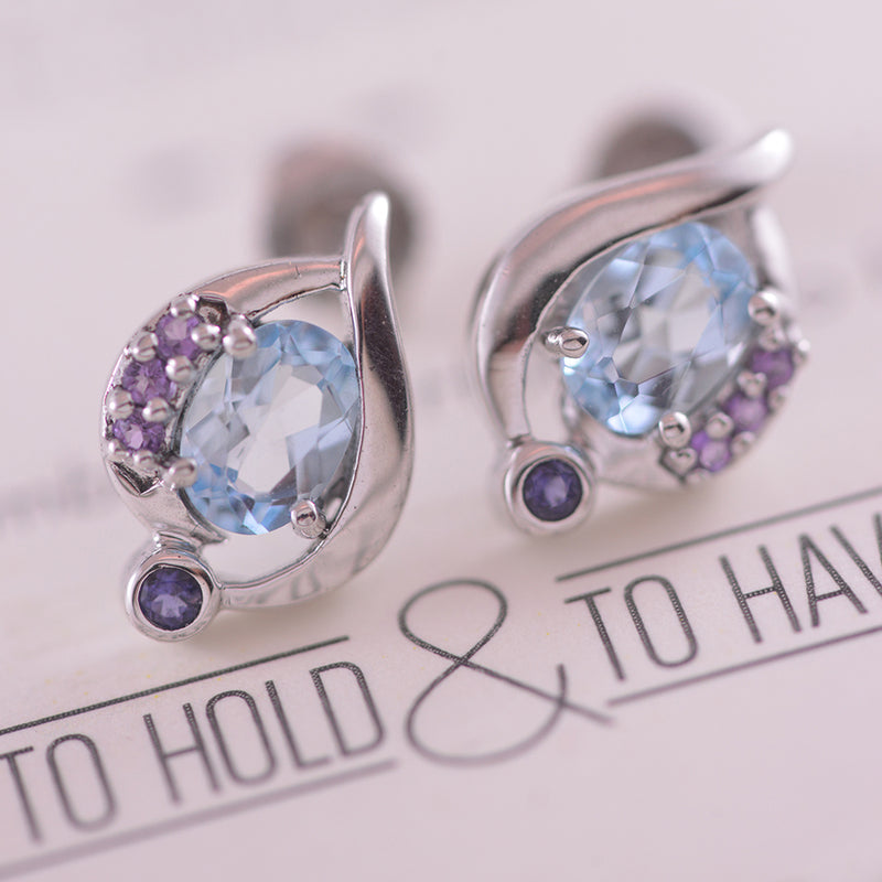 Sterling Silver Stud Earrings with Blue Topaz